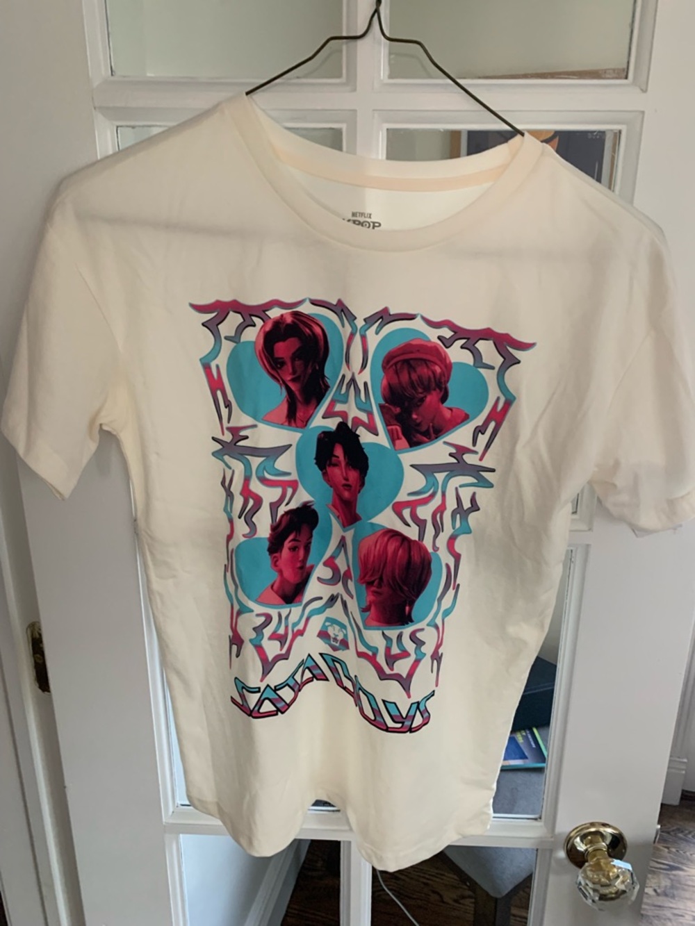 K-Pop
Demon Hinyers White Graphic Tee with Pink & Teal Portrait Design